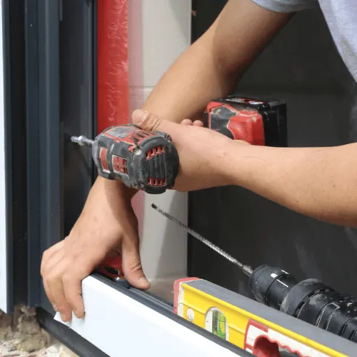 worker installing a new window (1)